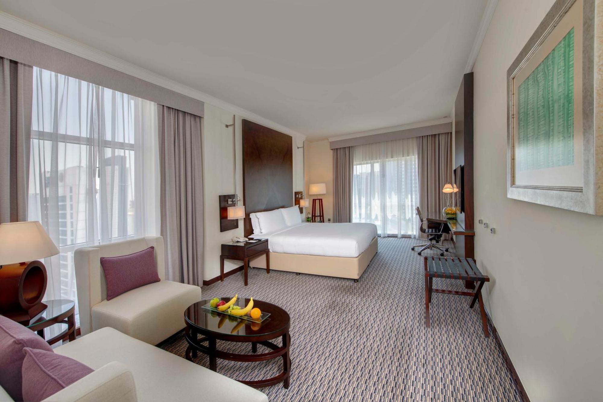 Отель Media Rotana Дубай Экстерьер фото A room at the hotel
